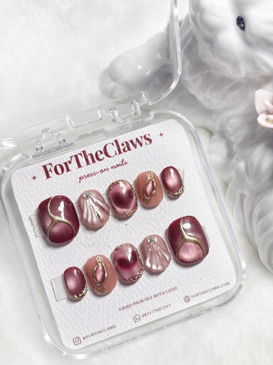Ruby Tide nail design